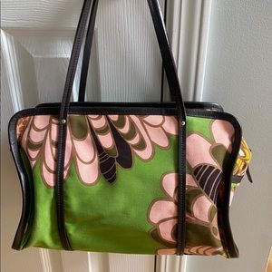 Beautiful Kate Spade purse. Black trim & bottom and fun floral fabric body.